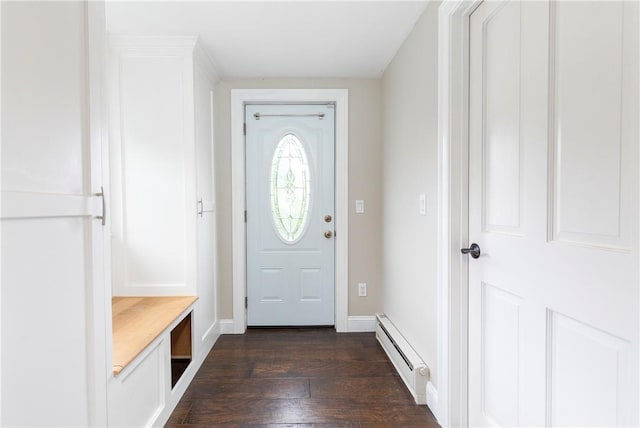 mudroom featuring dark wood-type flooring and a baseboard heating unit