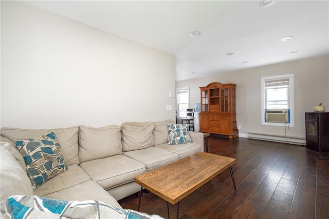 living room with cooling unit, baseboard heating, and dark wood-type flooring