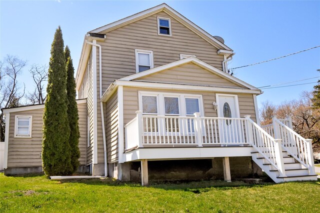 54 Midway Ave, Amenia, NY 12501 - view of front facade featuring a front lawn and a wooden deck