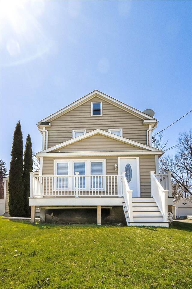 54 Midway Ave, Amenia, NY 12501 - traditional-style home with a front lawn and a deck