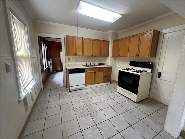 kitchen featuring white appliances, backsplash, crown molding, sink, and light tile patterned floors