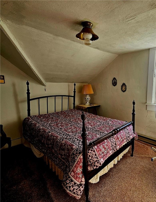 bedroom featuring a textured ceiling, carpet floors, vaulted ceiling, and ceiling fan