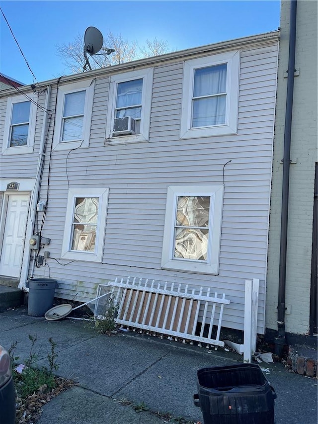 view of side of home with cooling unit