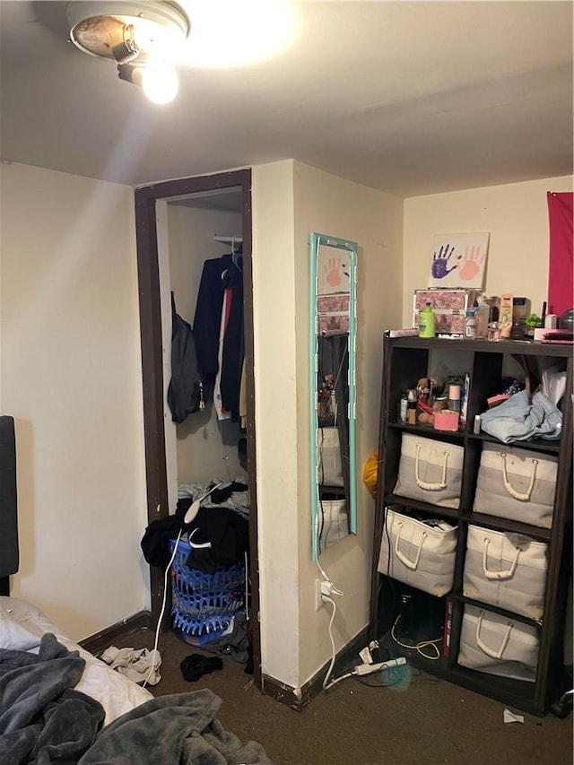 carpeted bedroom with a closet