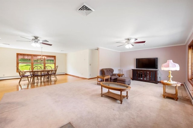 living room with ceiling fan with notable chandelier, light wood-type flooring, and ornamental molding