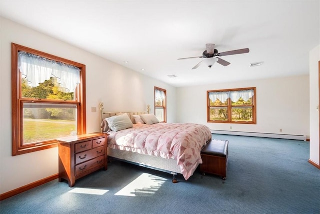 bedroom with ceiling fan, a baseboard radiator, and dark carpet