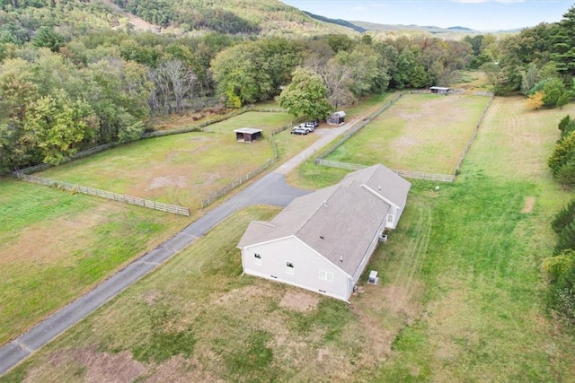 birds eye view of property featuring a rural view