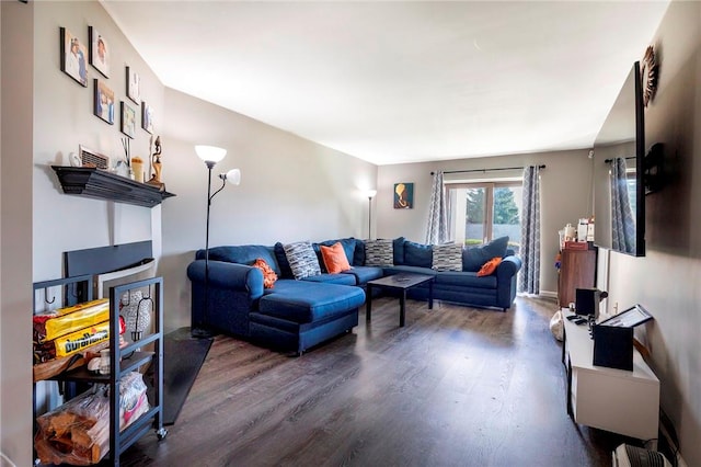 living room featuring dark hardwood / wood-style floors