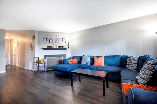 living room with dark hardwood / wood-style floors