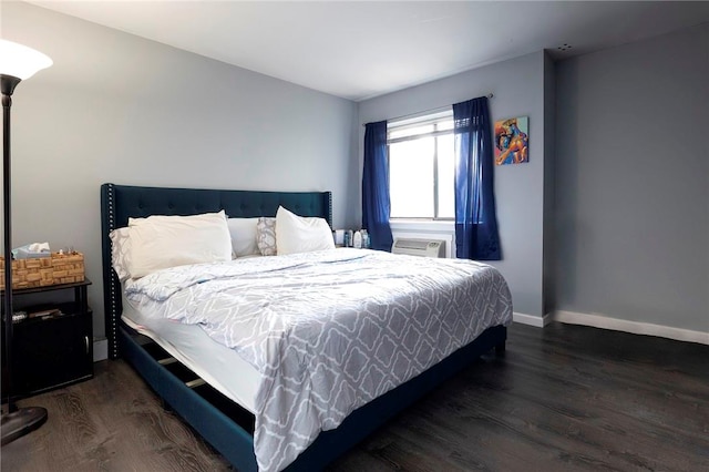 bedroom featuring dark hardwood / wood-style floors