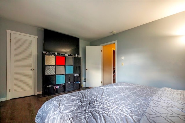 bedroom featuring dark hardwood / wood-style floors