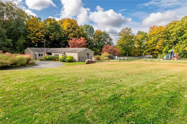 view of yard featuring a playground