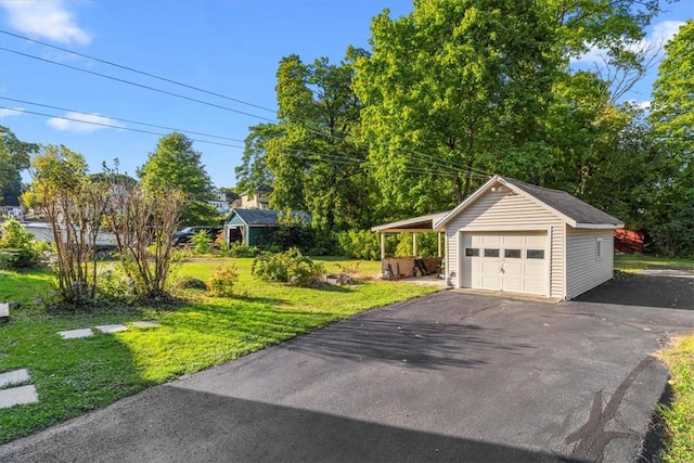 exterior space with a yard and a carport