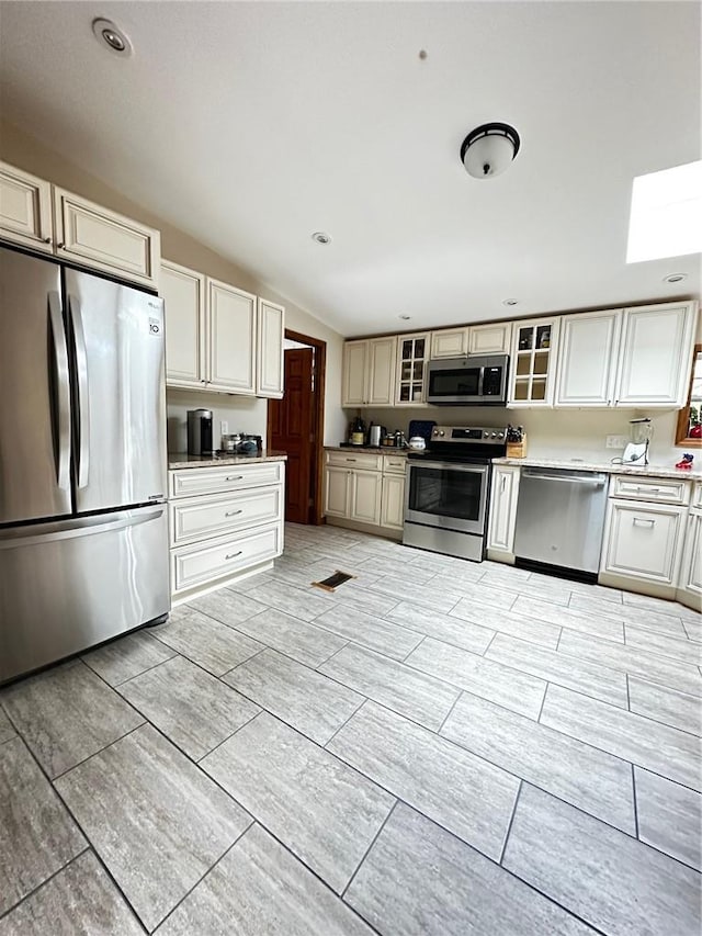 kitchen featuring stainless steel refrigerator