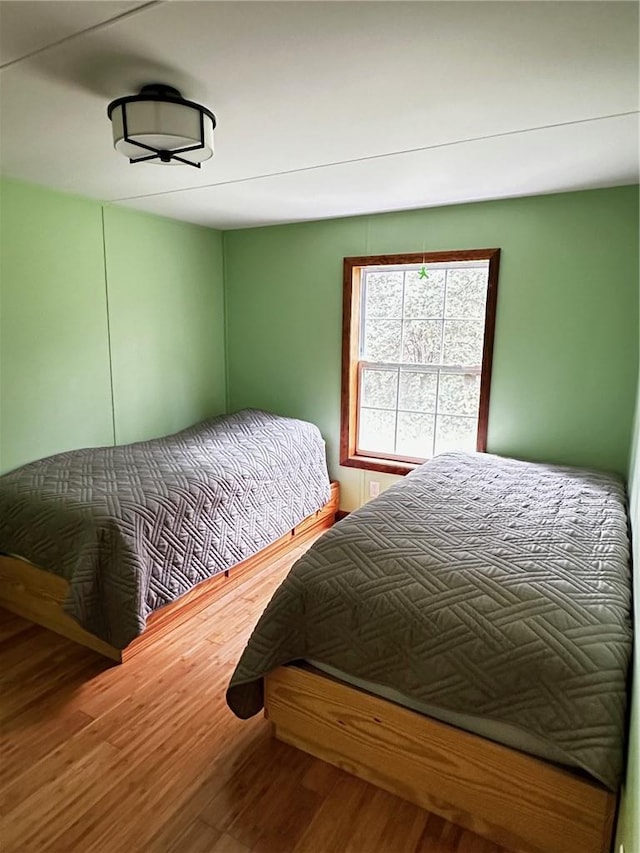 bedroom featuring hardwood / wood-style flooring