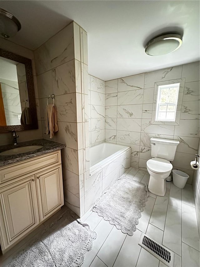 bathroom with tasteful backsplash