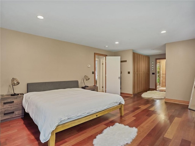 bedroom with wood-type flooring