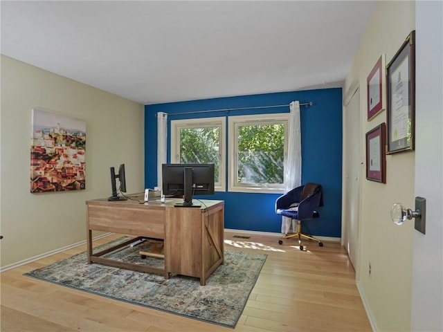 office space featuring light hardwood / wood-style floors