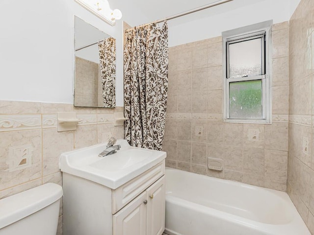 144 Ravine Ave Unit 2C, Yonkers, NY 10701 - bathroom featuring tile walls, toilet, vanity, and shower / tub combo with curtain