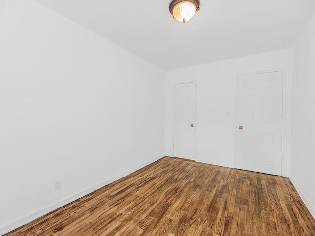 144 Ravine Ave Unit 2C, Yonkers, NY 10701 - spare room featuring wood finished floors and baseboards