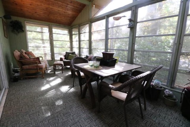 sunroom with wood ceiling and vaulted ceiling