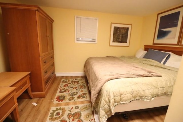 bedroom featuring light hardwood / wood-style floors