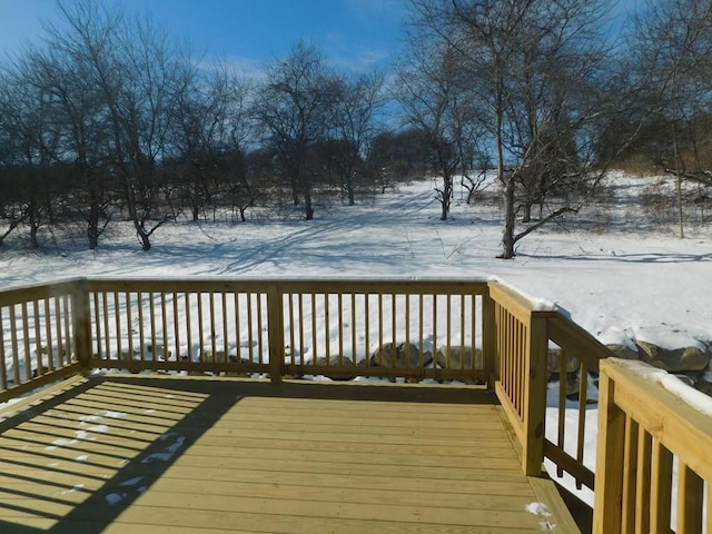 view of snow covered deck