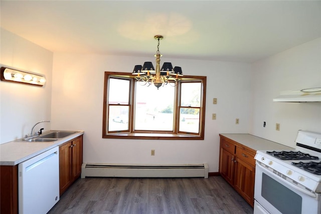 kitchen with white appliances, dark wood-type flooring, sink, a baseboard radiator, and a chandelier