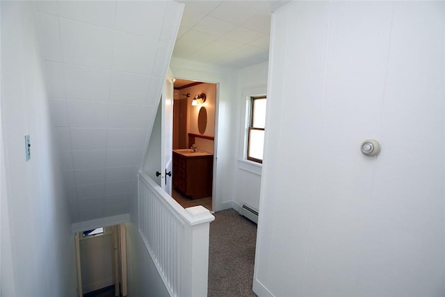 bathroom featuring baseboard heating