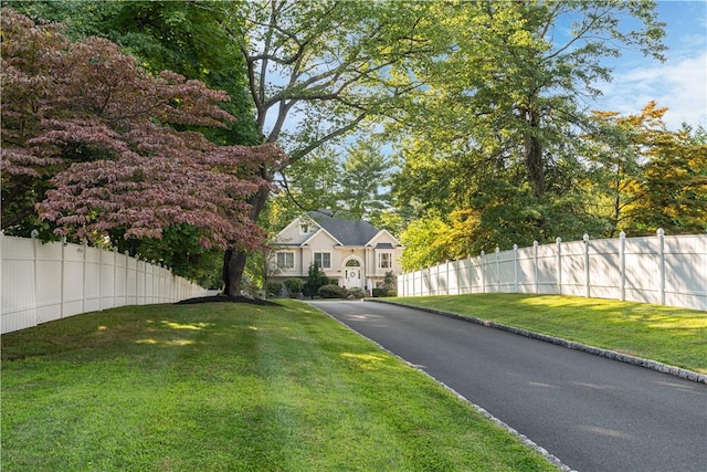 exterior space featuring a front lawn