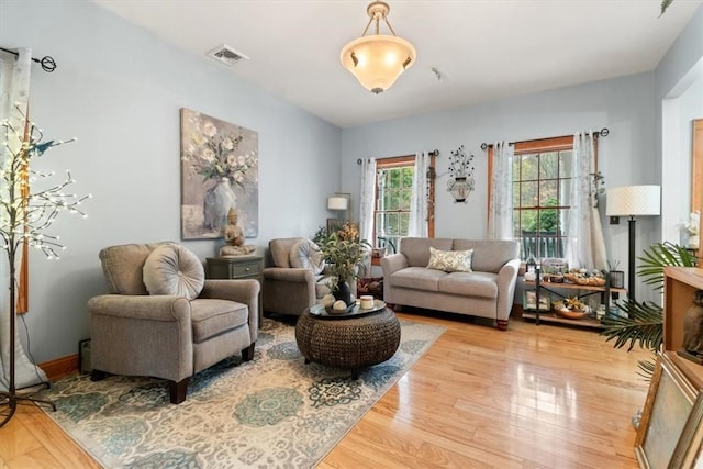 sitting room with light wood-type flooring