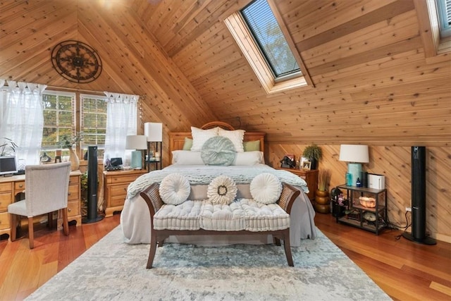 bedroom featuring a skylight, wooden walls, wood ceiling, and hardwood / wood-style flooring