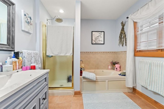 bathroom featuring vanity, tile patterned floors, and independent shower and bath