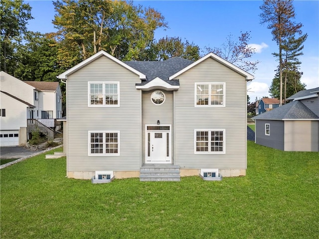 view of front of house with a front lawn