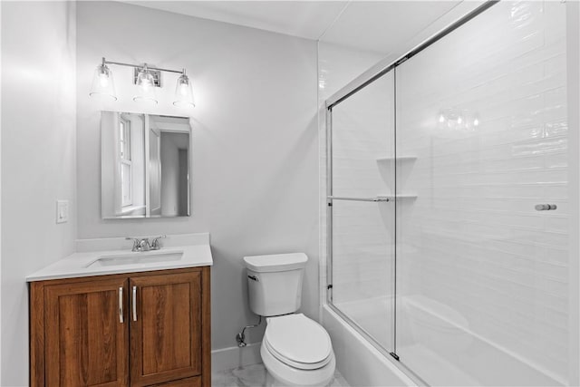 full bathroom with shower / bath combination with glass door, vanity, and toilet