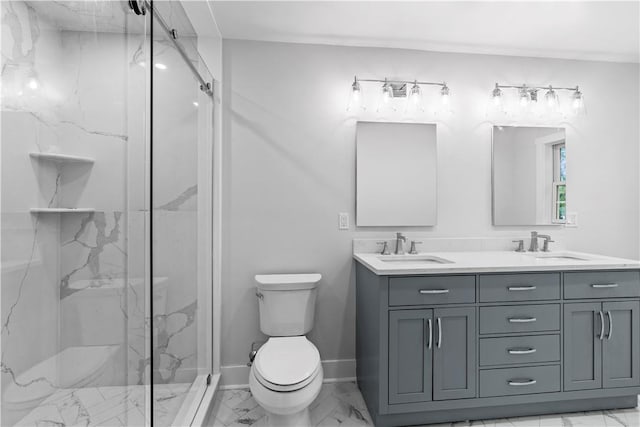 bathroom with vanity, toilet, and a shower with door