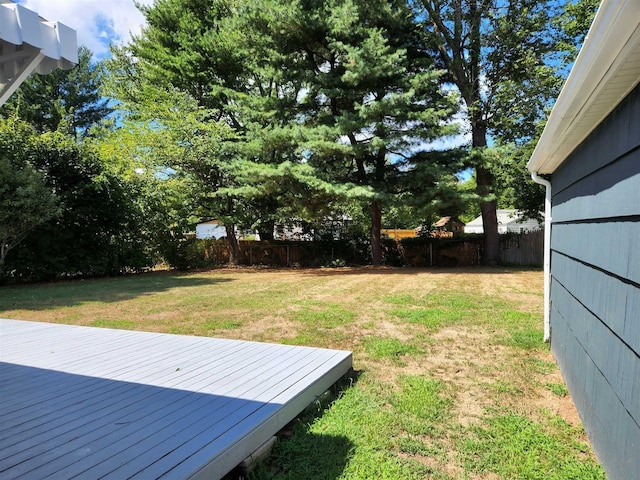 view of yard featuring a wooden deck