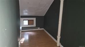 hall featuring wood-type flooring