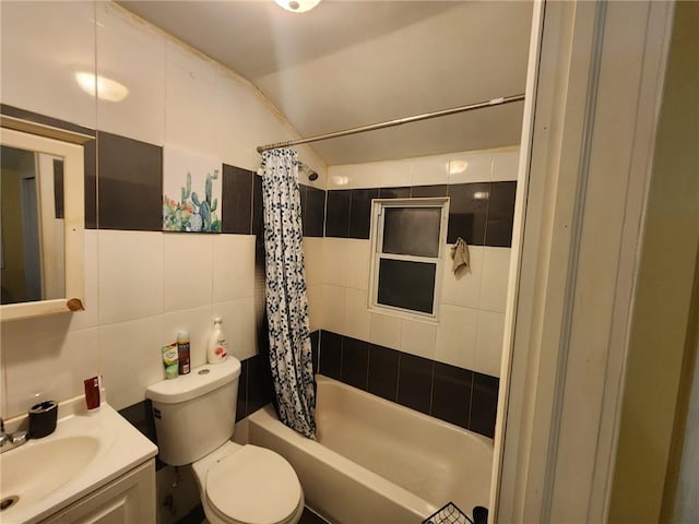 full bathroom with shower / tub combo, backsplash, vanity, tile walls, and toilet