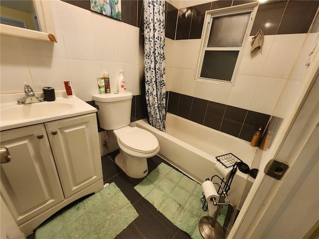 full bathroom featuring vanity, decorative backsplash, toilet, tile walls, and shower / tub combo