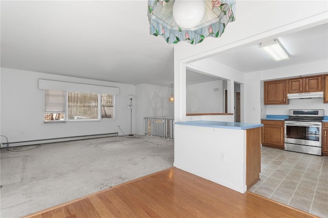 kitchen with stainless steel stove, a baseboard radiator, and light hardwood / wood-style floors