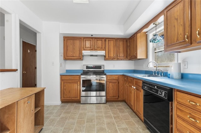 kitchen featuring dishwasher, decorative light fixtures, sink, and stainless steel stove