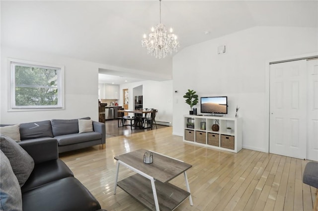 living room featuring light wood-type flooring, a baseboard radiator, lofted ceiling, and a notable chandelier