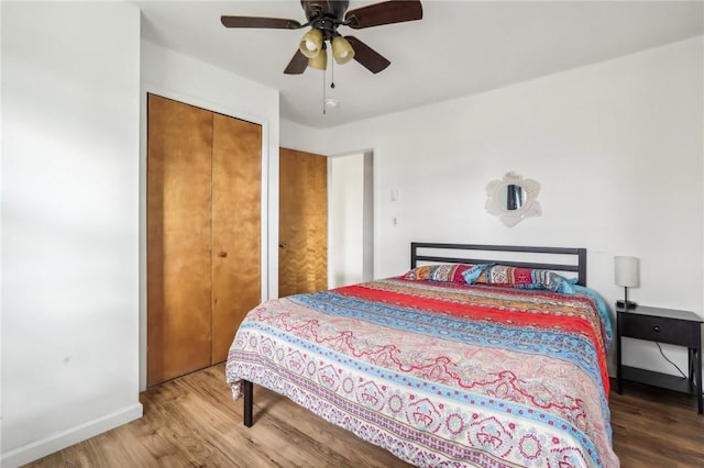 bedroom featuring ceiling fan and wood-type flooring