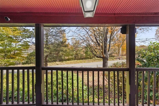 exterior space featuring a wealth of natural light and wooden ceiling