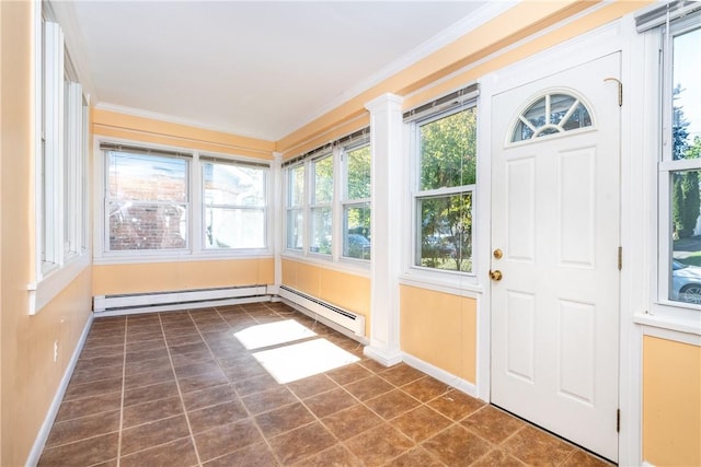 unfurnished sunroom with baseboard heating and a wealth of natural light