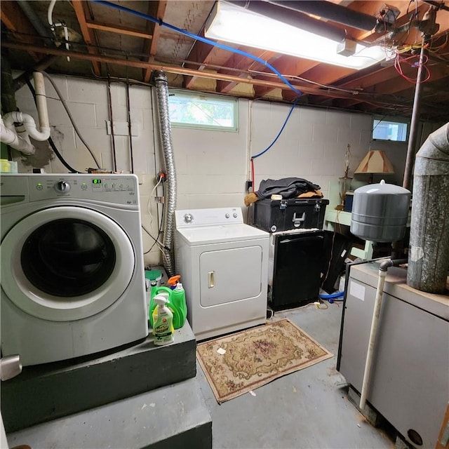 washroom with separate washer and dryer