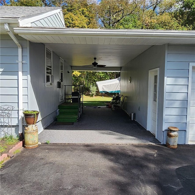 view of parking / parking lot with a carport