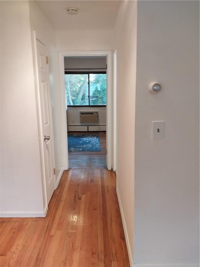 bathroom featuring wooden walls