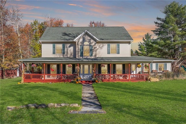 farmhouse inspired home featuring a yard